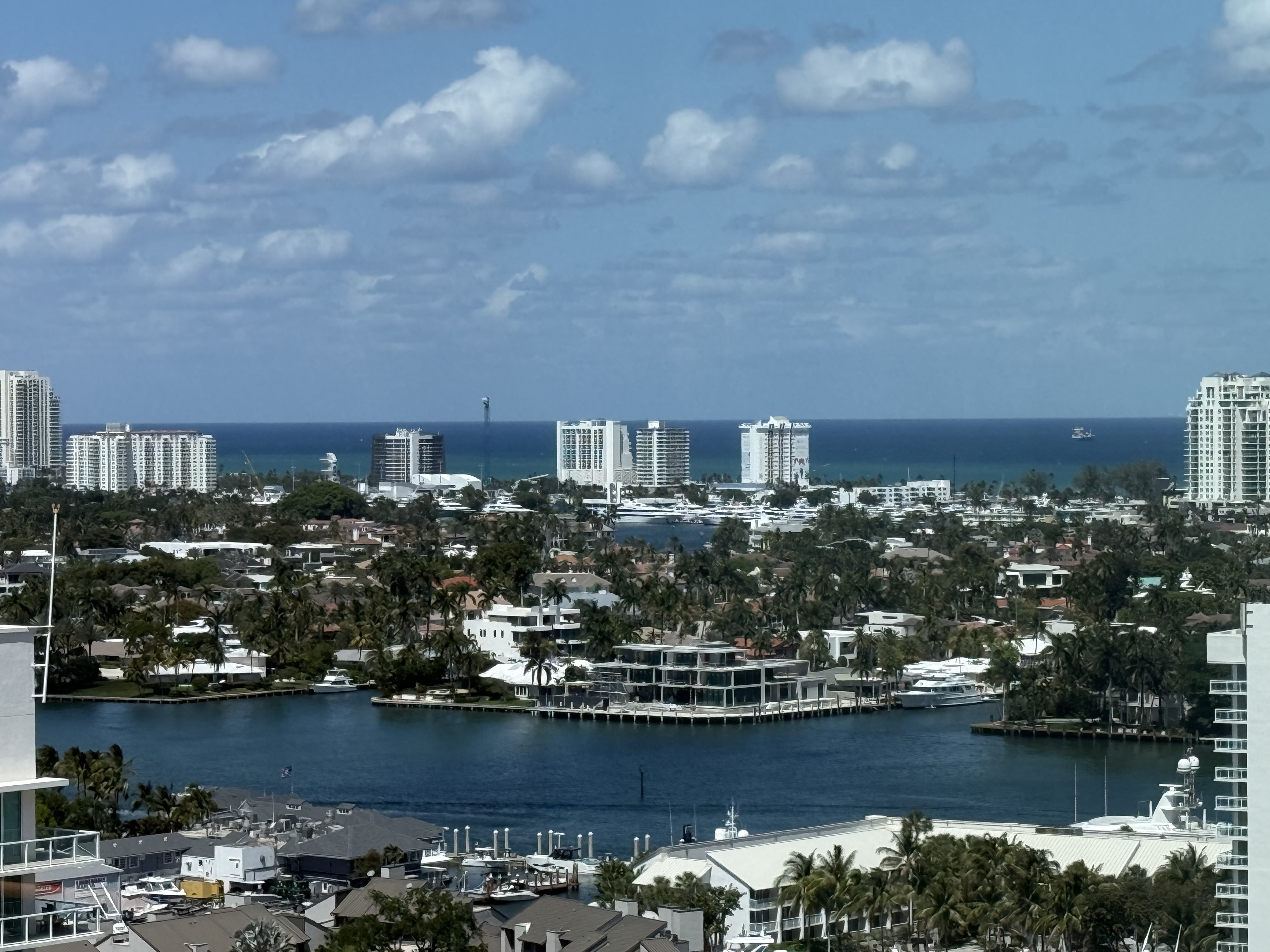 waterfront photo from the Omni Ft. Lauderdale hotel with blue sky and clouds