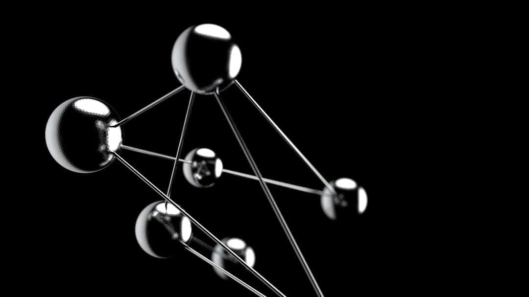 silver balls connected with metal 