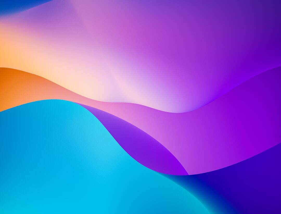 abstract layers of color from light blue, blue, dark purple light purple and orange