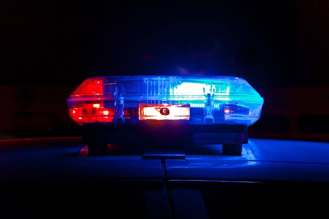 dark background with red and blue police light