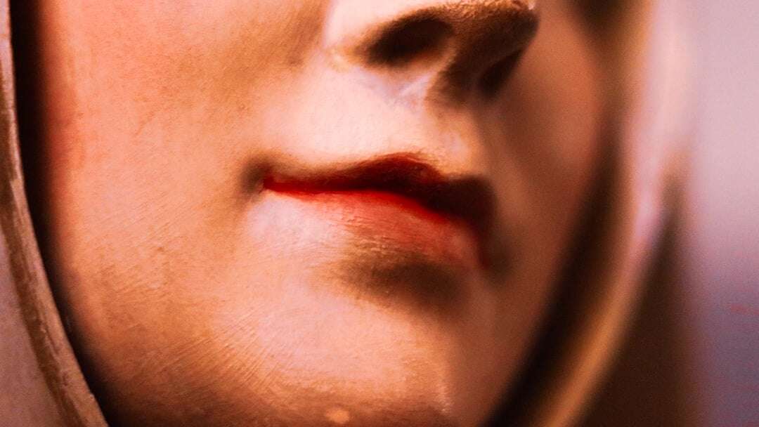 close up image of face focusing on lower half of face and lips