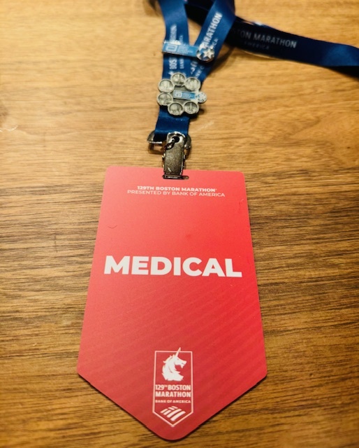 red badge that is for medical team of the 129th boston marathon